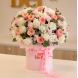BIG 26 Arrangement in a box with peonies and peony roses. Size L in the photo