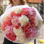 A delicate bouquet with hydrangeas and roses BIG 73