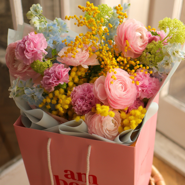  Bouquet with ranunculus, delphinium, mimosa and dianthus BOUQUET 240