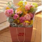  Bouquet with ranunculus, delphinium, mimosa and dianthus BOUQUET 240